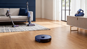 Robot And Traditional Vacuum Cleaners In A Modern Home.jpg