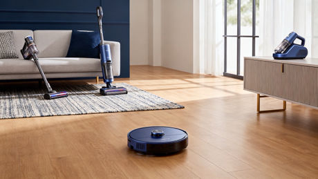 Robot And Traditional Vacuum Cleaners In A Modern Home.jpg